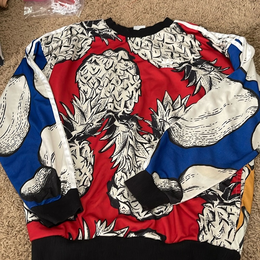 Adidas pineapple track suit size small.